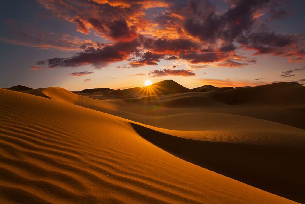 Sunset over Saharan sand dunes. Image: Anton Petrus/Shutterstock